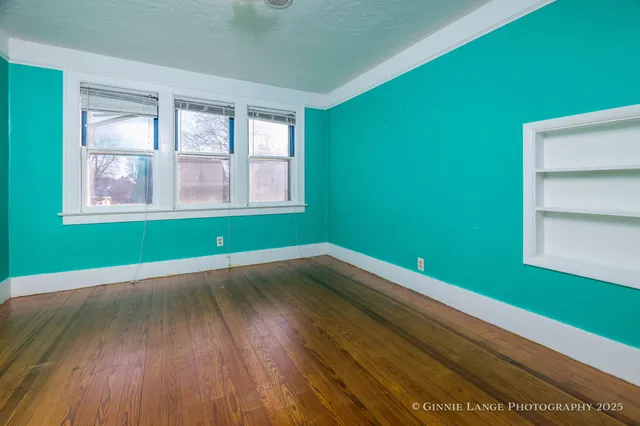 an empty room with windows