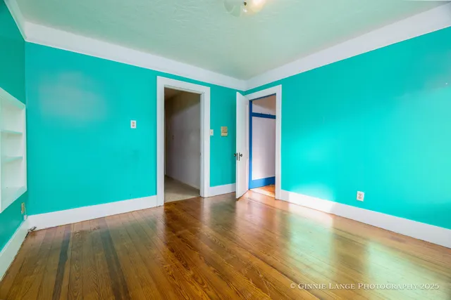 an empty room with windows