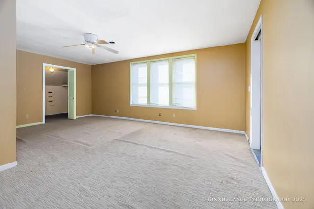 a view of an empty walk in closet