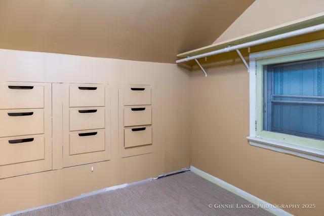 a backyard of a house with seating space