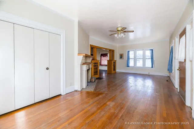 a view of livingroom with furniture wooden floor and windows