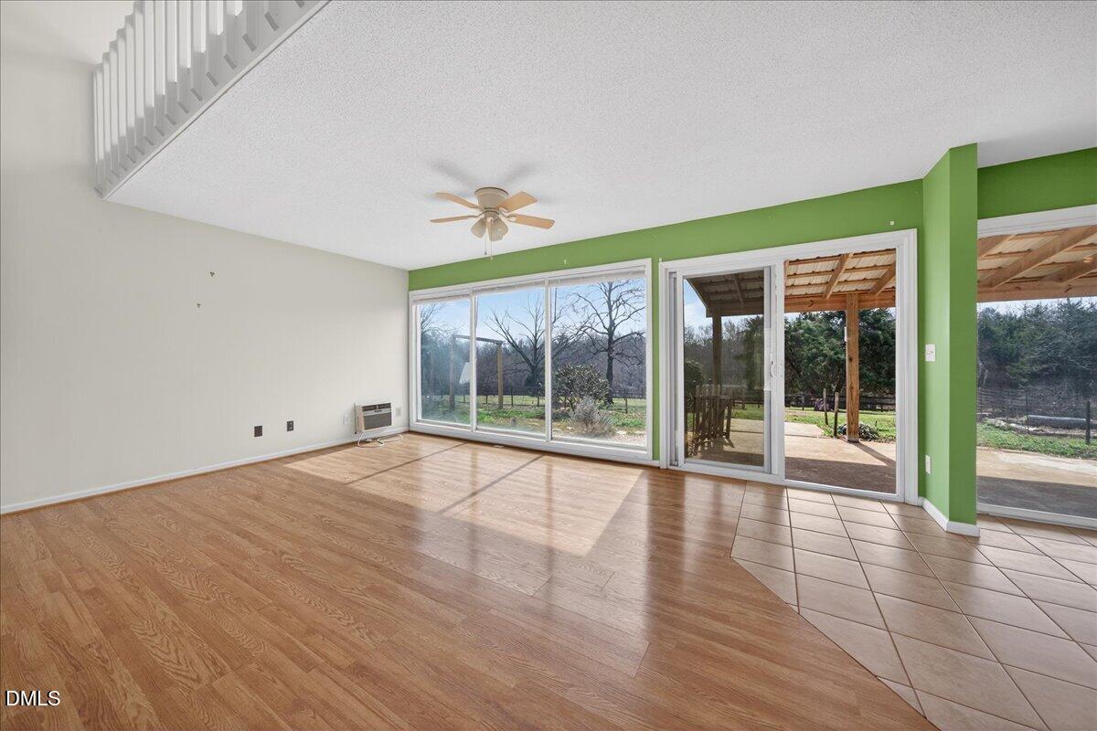 180 Manor Drive Timberlake, NC 27583 - Photo 10 of 85 a view of an entryway with wooden floor