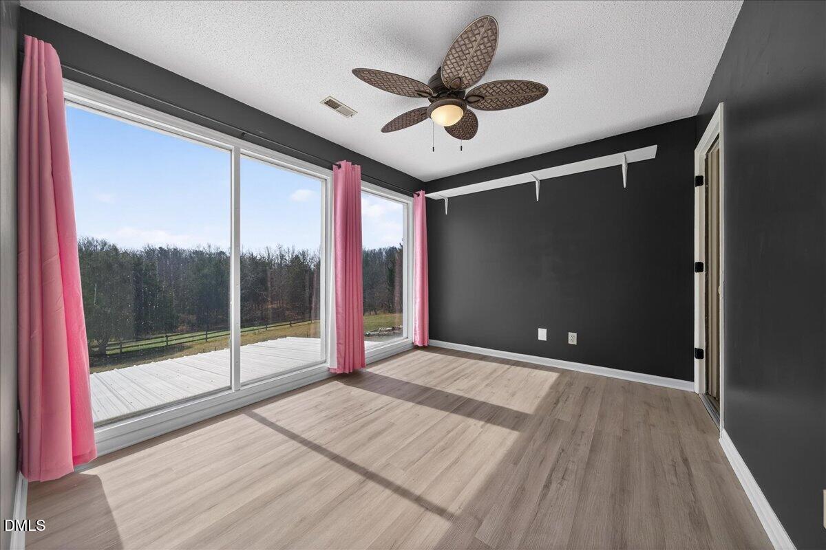 180 Manor Drive Timberlake, NC 27583 - Photo 45 of 85 a view of an empty room with a window