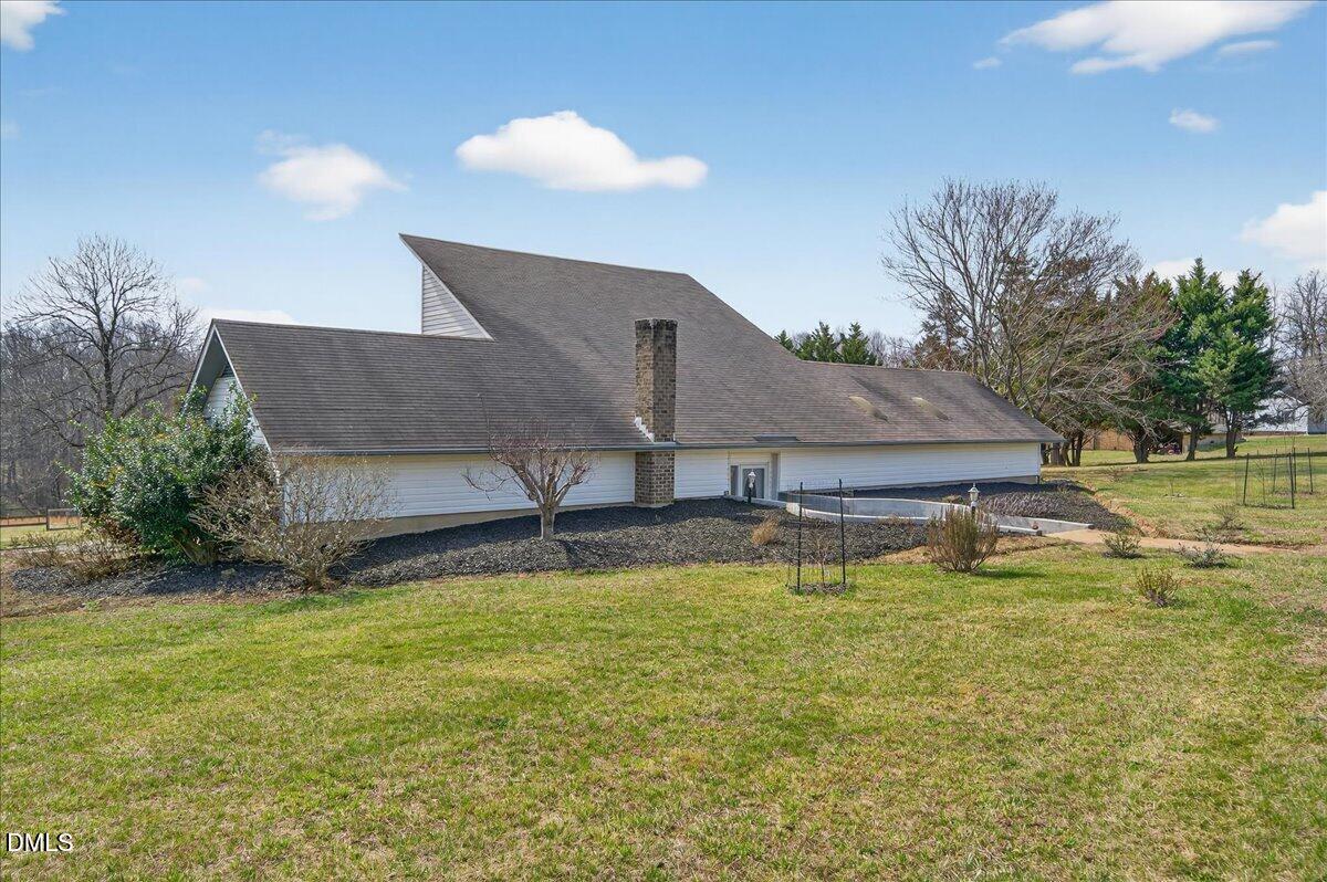 180 Manor Drive Timberlake, NC 27583 - Photo 4 of 85 41-Exterior_180ManorDrive_113