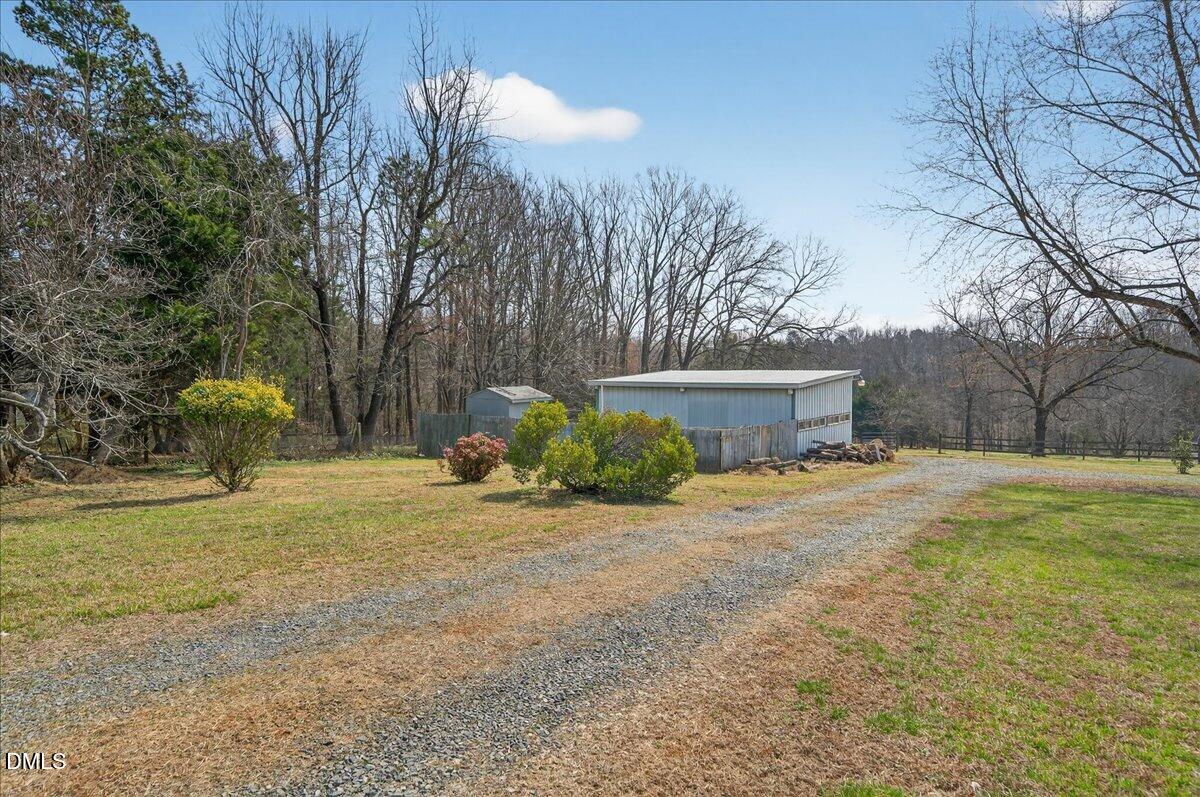 180 Manor Drive Timberlake, NC 27583 - Photo 60 of 85 a view of a outdoor space with a house
