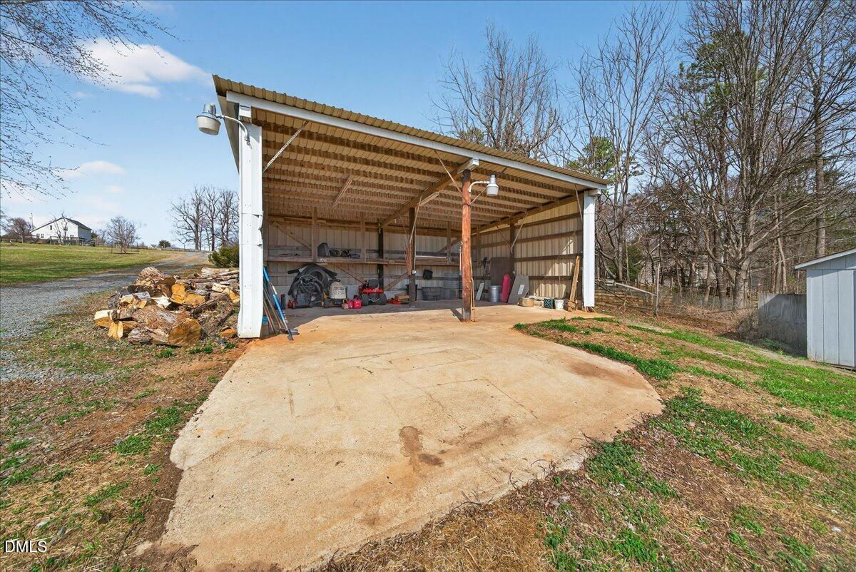 180 Manor Drive Timberlake, NC 27583 - Photo 61 of 85 a view of a house with backyard and sitting area