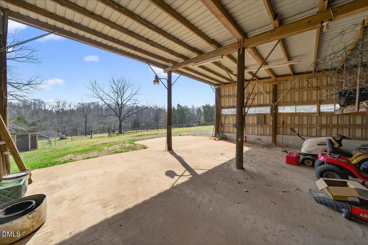 180 Manor Drive Timberlake, NC 27583 - Photo 63 of 85 a view of yard with porch and furniture