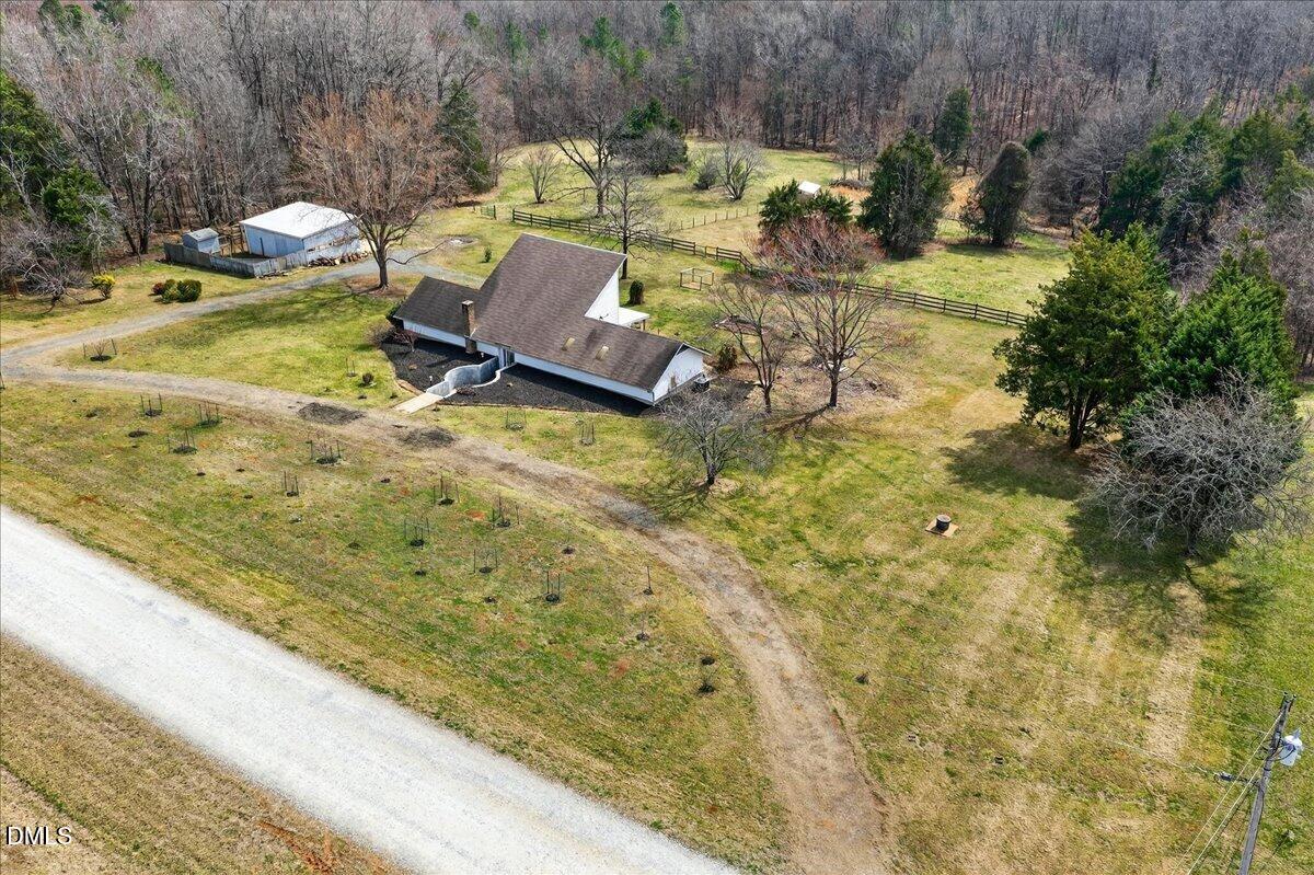 180 Manor Drive Timberlake, NC 27583 - Photo 72 of 85 a view of a swimming pool with a patio