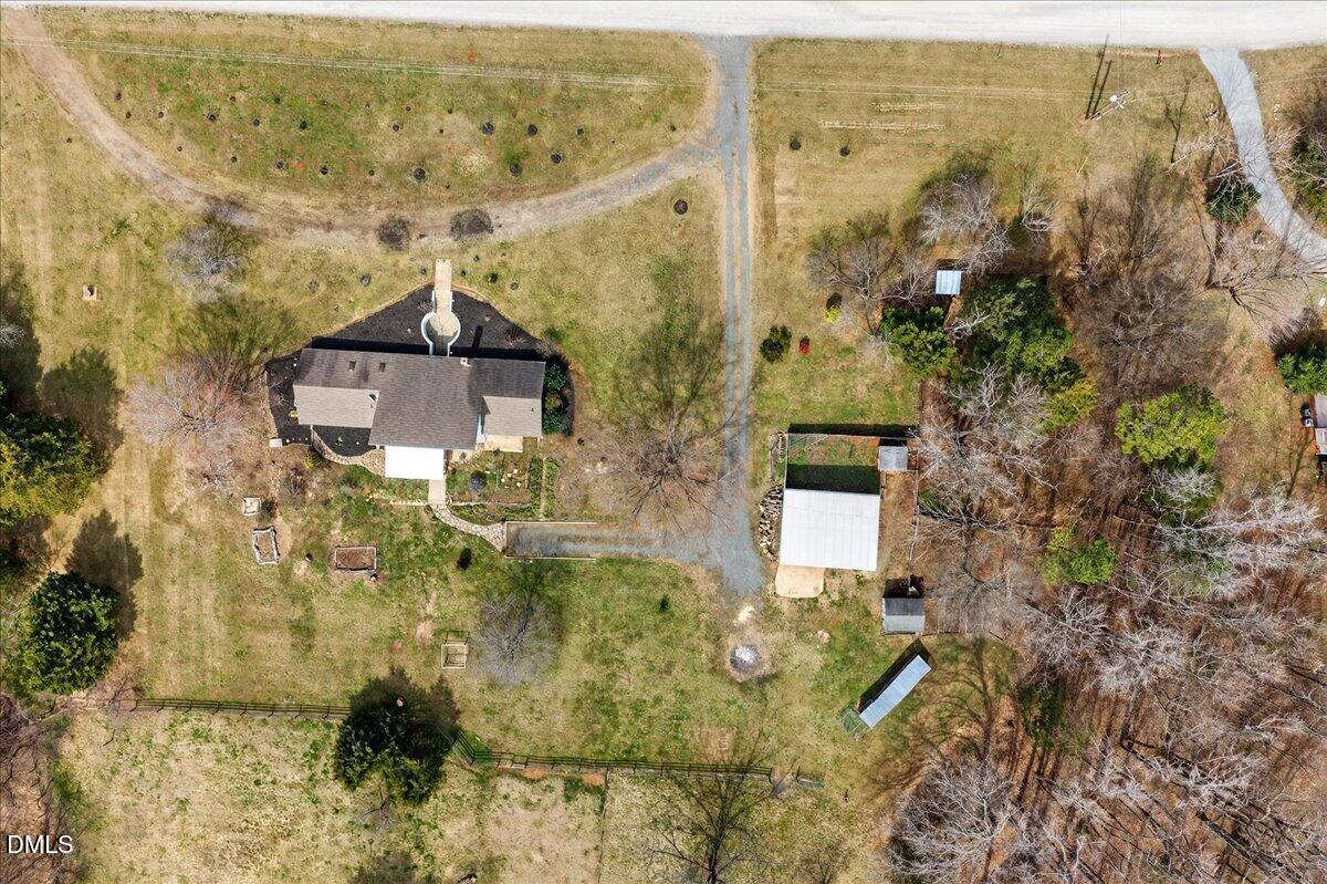 180 Manor Drive Timberlake, NC 27583 - Photo 77 of 85 a aerial view of a house with a yard