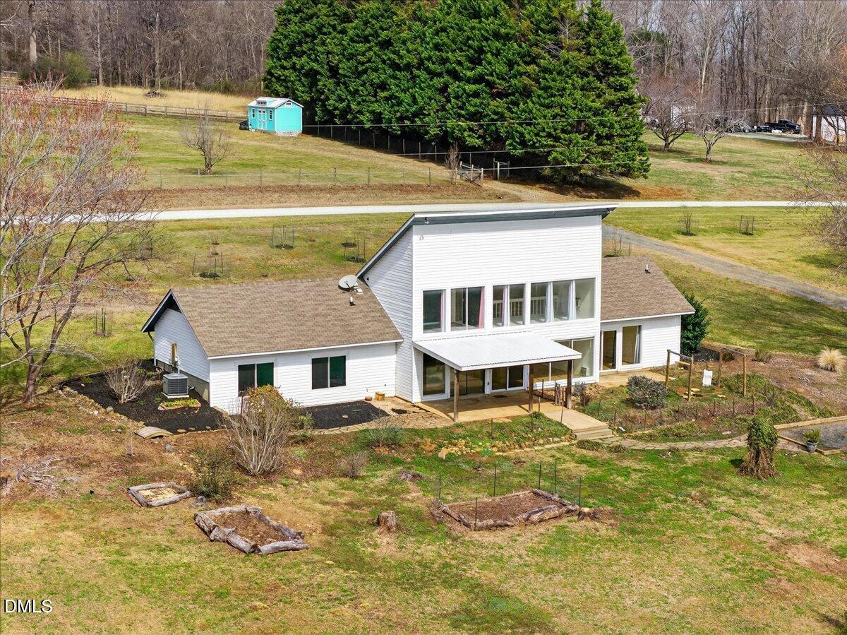 180 Manor Drive Timberlake, NC 27583 - Photo 79 of 85 a view of a house with a swimming pool