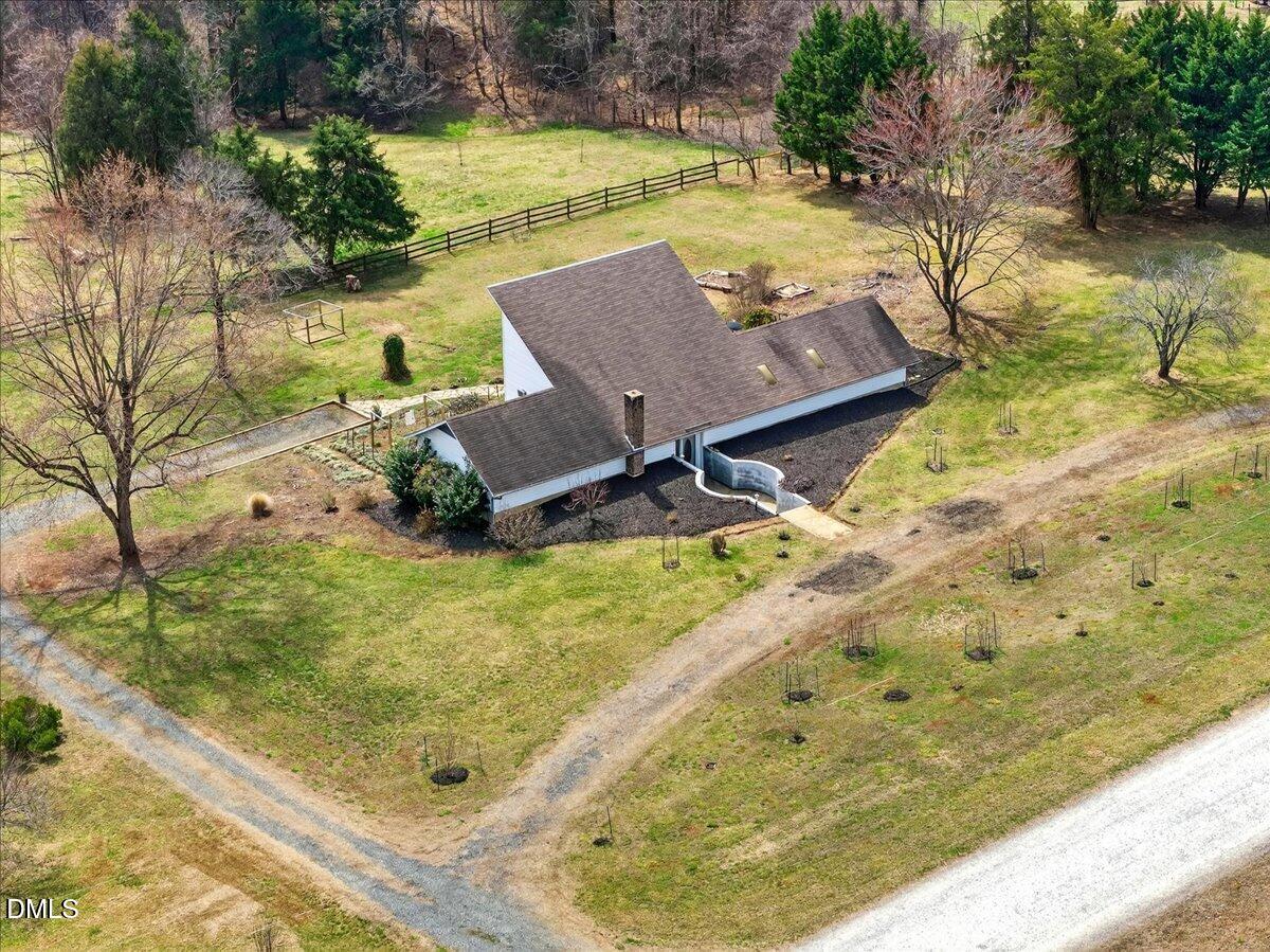 180 Manor Drive Timberlake, NC 27583 - Photo 80 of 85 a view of a swimming pool with a yard