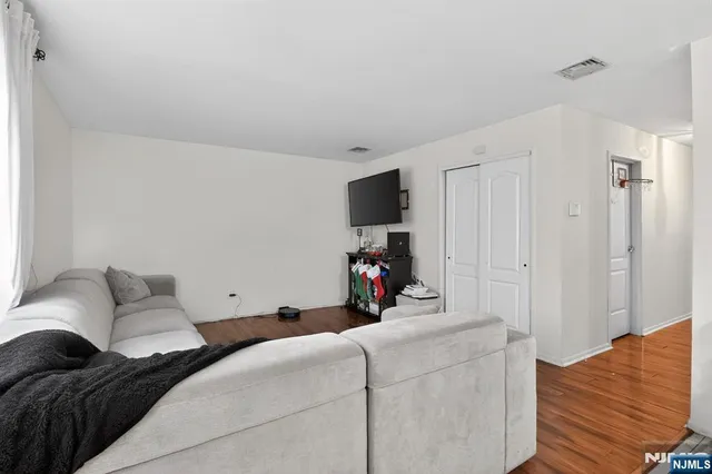 a bed room with a bed and a couch