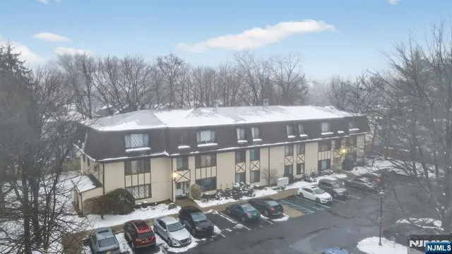 a view of a building with a yard