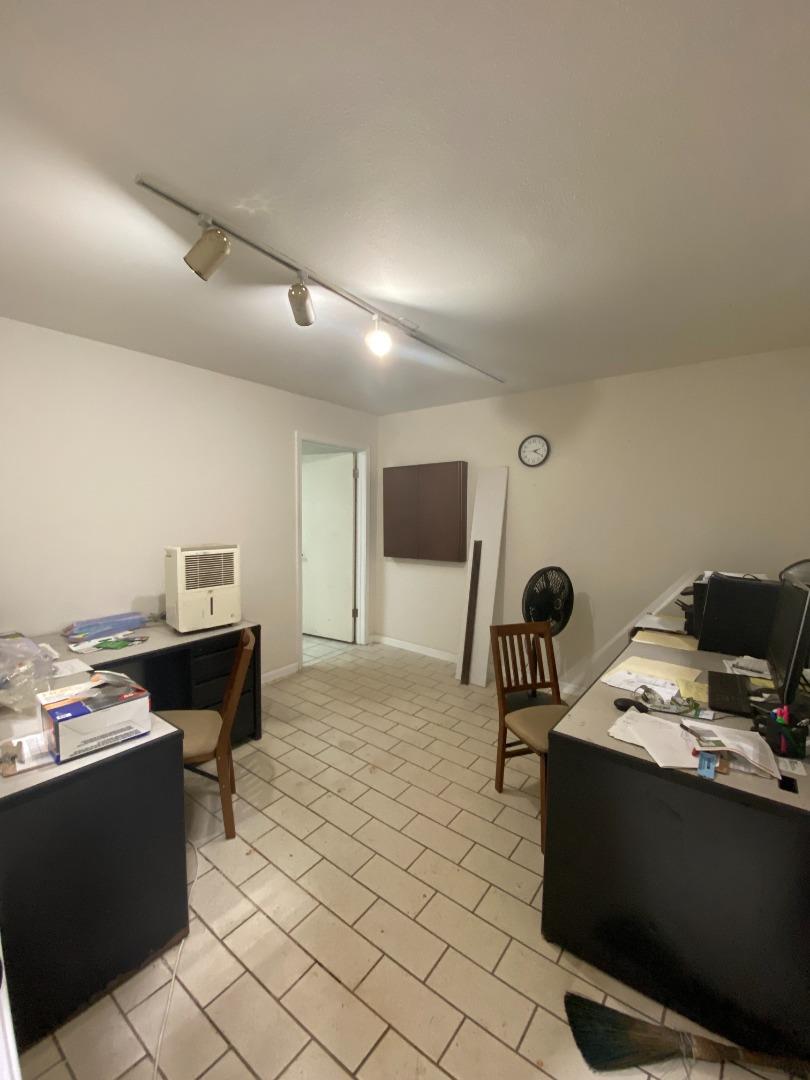 189 Hughes Road Watsonville, CA 95076 - Photo 17 of 35 a living room with furniture and a table