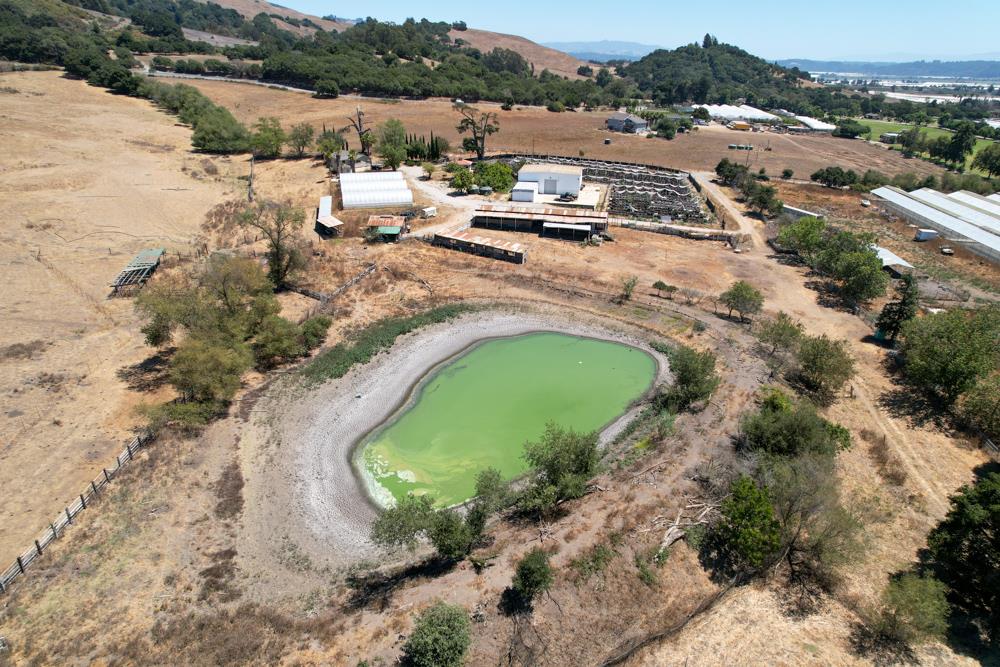 189 Hughes Road Watsonville, CA 95076 - Photo 24 of 35 an aerial view of a house with a swimming pool