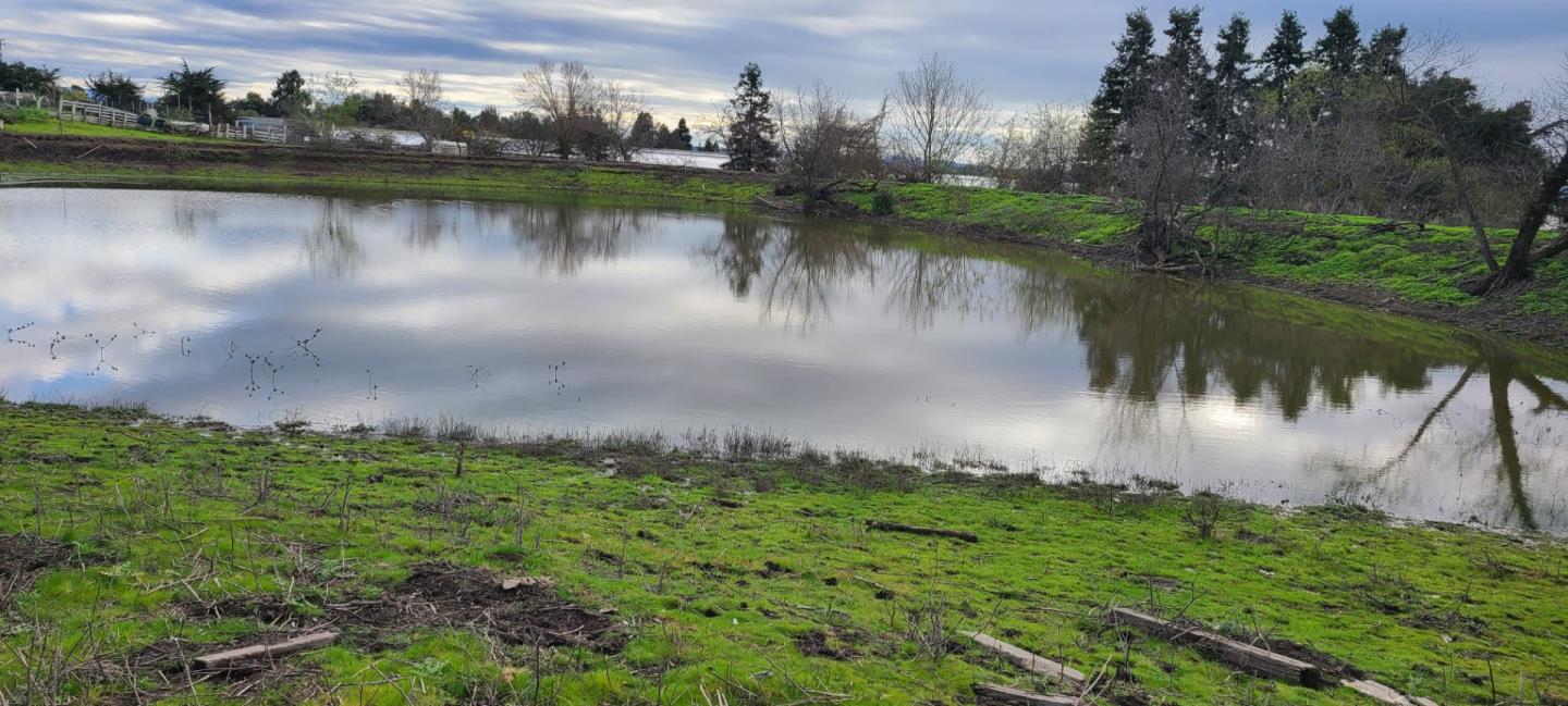 189 Hughes Road Watsonville, CA 95076 - Photo 25 of 35 a view of a lake in middle of forest