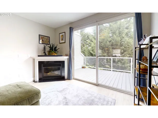 a black and white photo of a living room