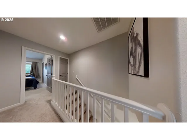 a bedroom with a bed and a mirror