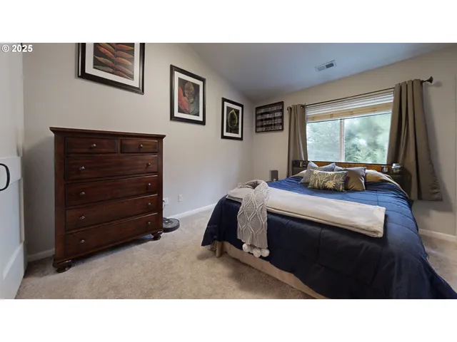 a view of a hallway with a bedroom