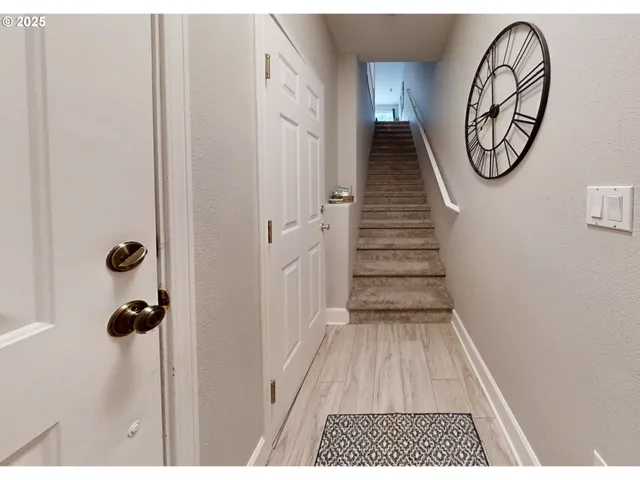 a view of a house with a wooden deck