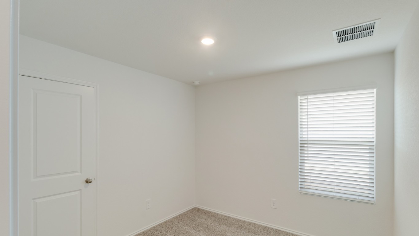 345 Bull Lake Circle Buda, TX 78610 - Photo 15 of 17 a view of a small space with a window