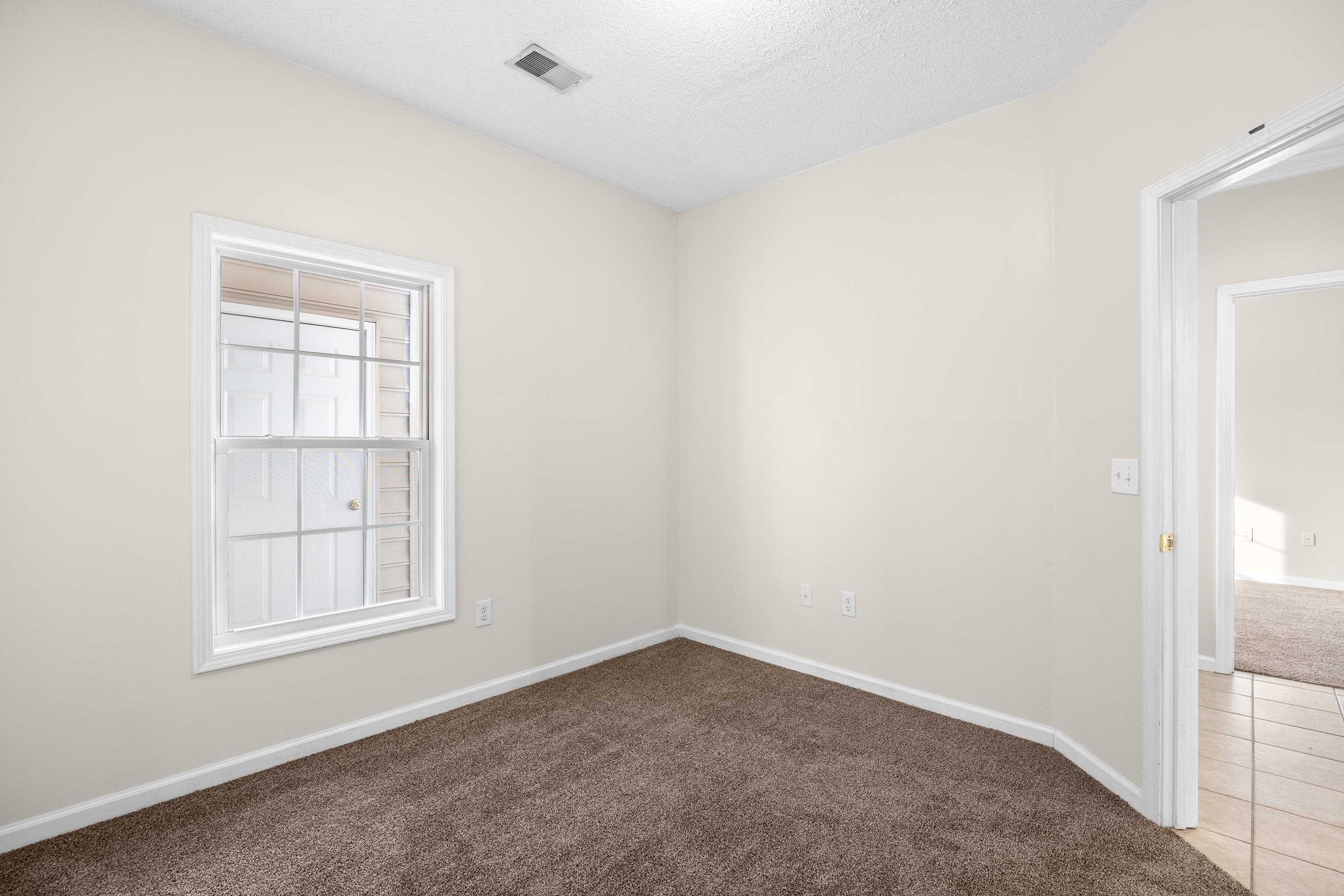 5846 Longwood Drive, Unit 203 Murrells Inlet, SC 29576 - Photo 8 of 38 New carpet, bi-fold doors on the closet.