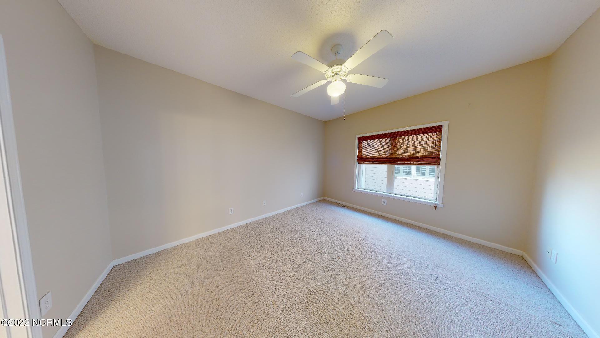 409 27th Street, Unit A Sunset Beach, NC 28468 - Photo 15 of 37 Master Bedroom