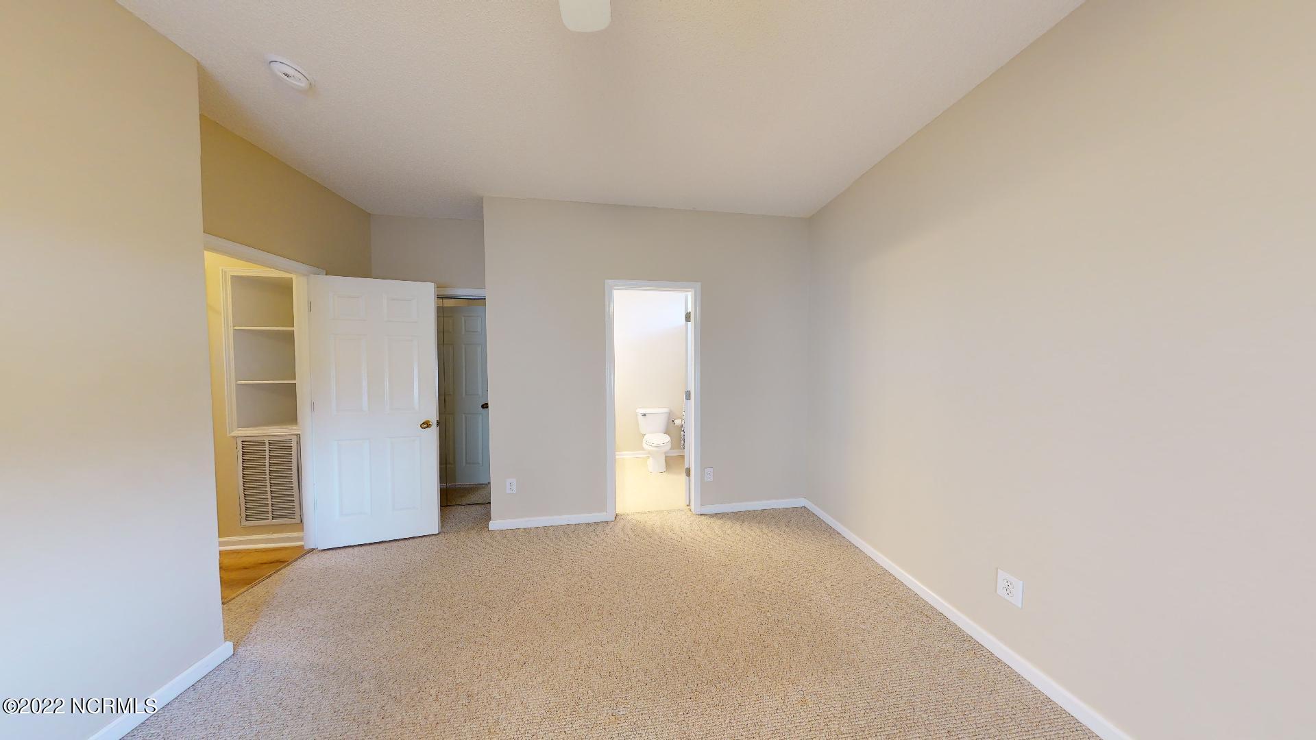 409 27th Street, Unit A Sunset Beach, NC 28468 - Photo 16 of 37 Large Walk-in Closet