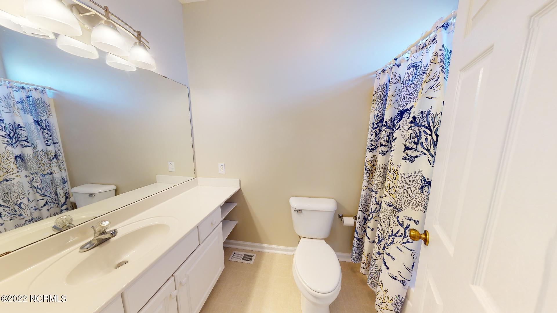 409 27th Street, Unit A Sunset Beach, NC 28468 - Photo 17 of 37 Master Bathroom