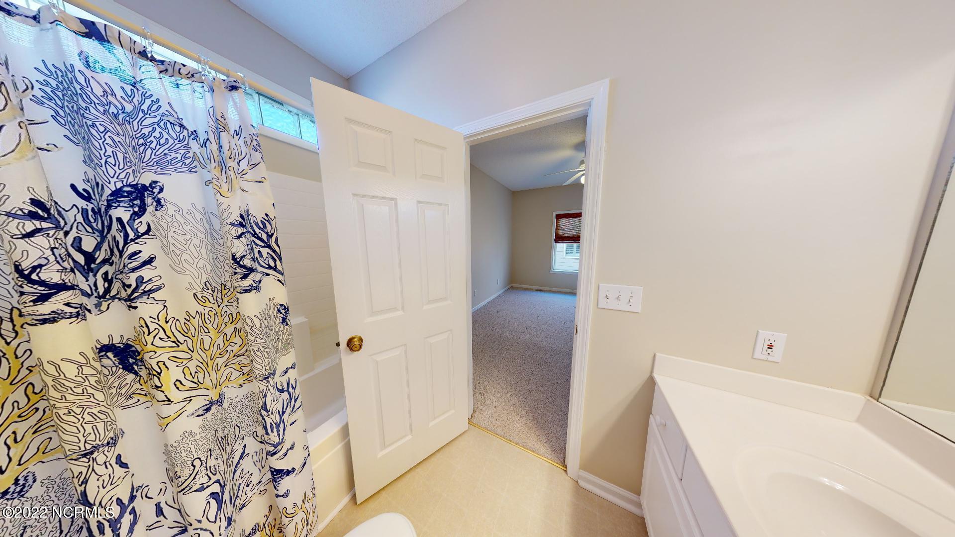 409 27th Street, Unit A Sunset Beach, NC 28468 - Photo 18 of 37 Master Bathroom