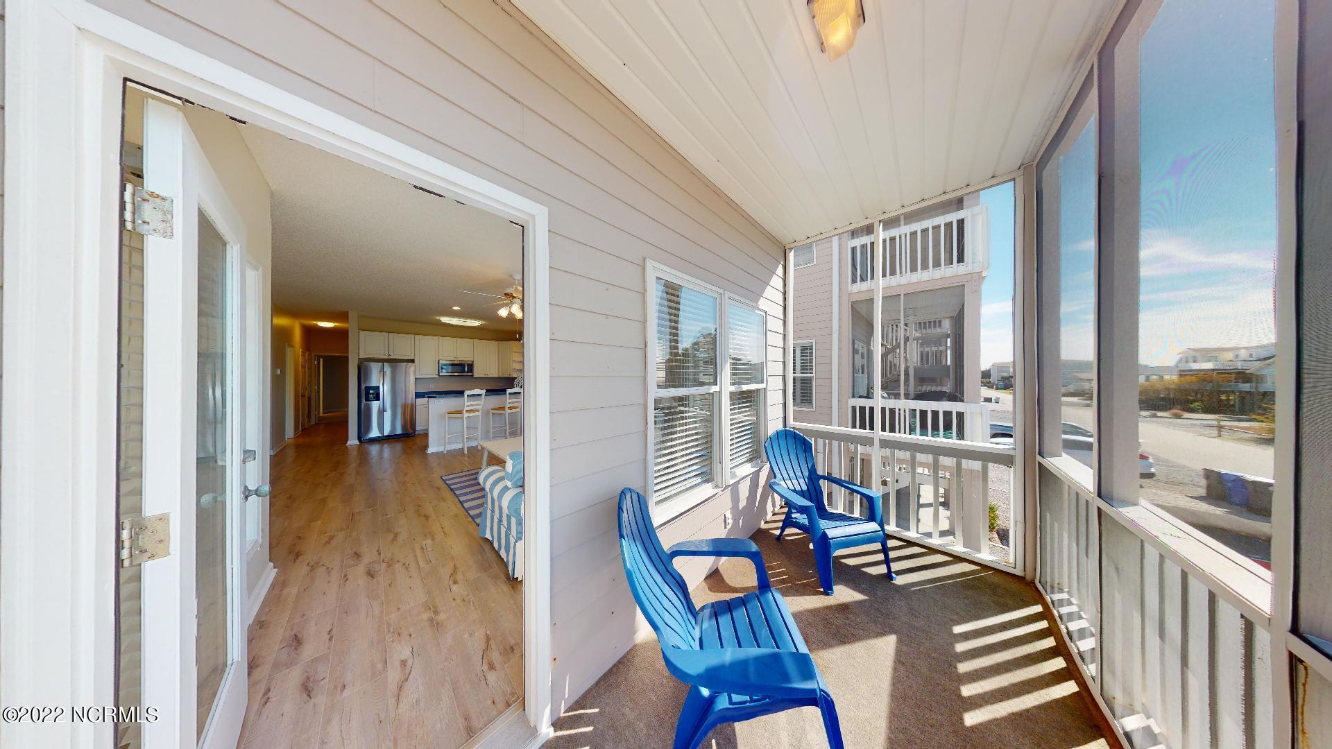 409 27th Street, Unit A Sunset Beach, NC 28468 - Photo 19 of 37 Front Deck