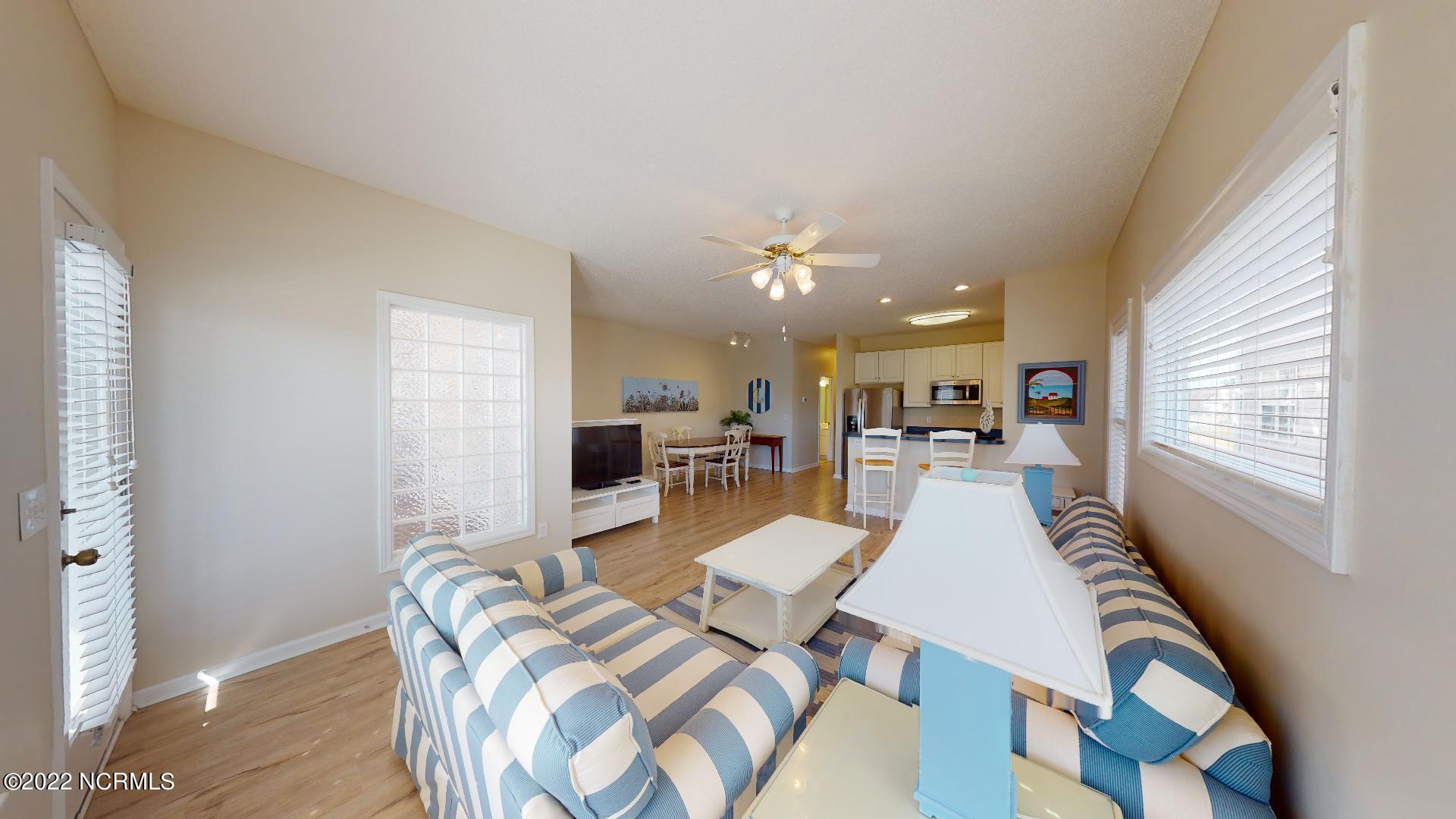 409 27th Street, Unit A Sunset Beach, NC 28468 - Photo 5 of 37 Front Porch Entry