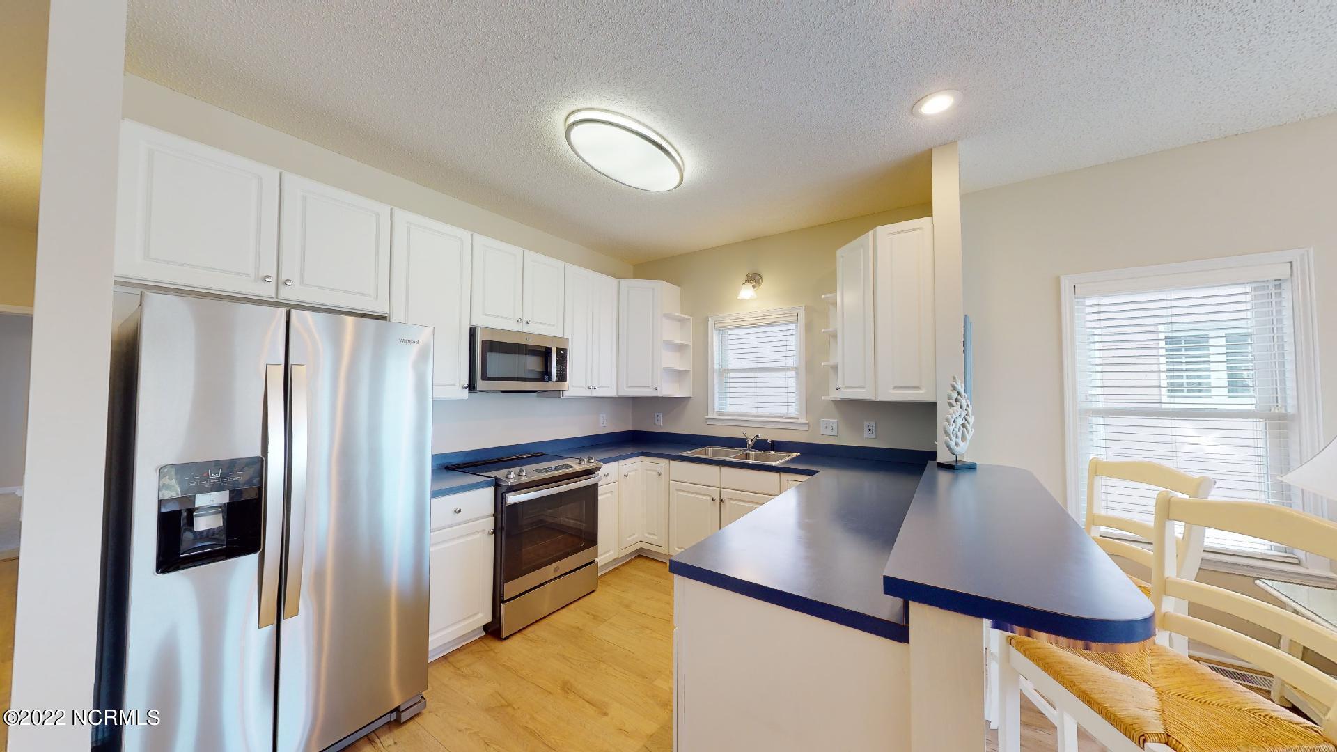 409 27th Street, Unit A Sunset Beach, NC 28468 - Photo 10 of 37 Stainless Steal Whirlpool Appliances