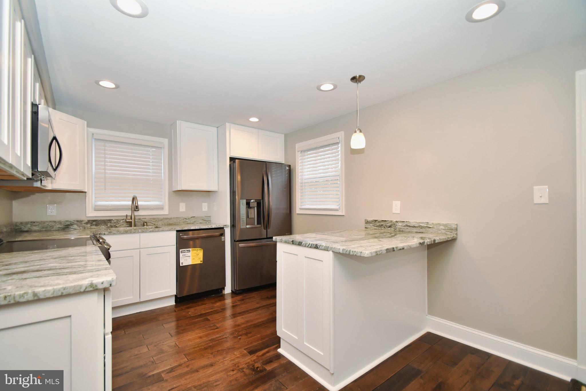 4817 Variation Road Baltimore, MD 21236 - Photo 14 of 42 Kitchen Island is some great extra space!