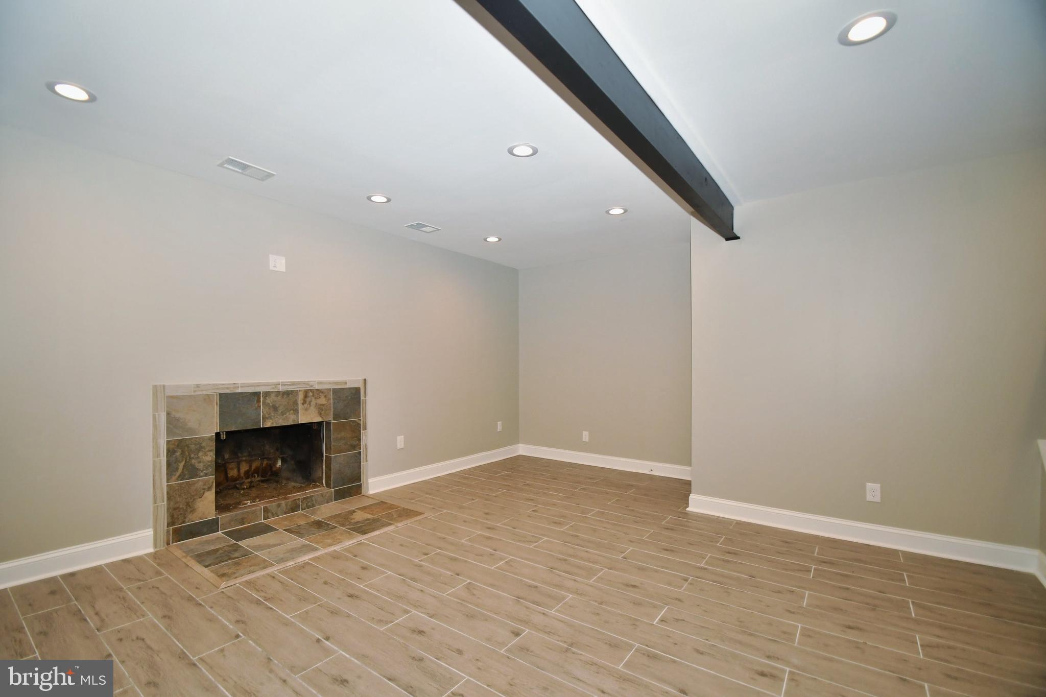 4817 Variation Road Baltimore, MD 21236 - Photo 33 of 42 Newly finished basement, perfect for entertaining!