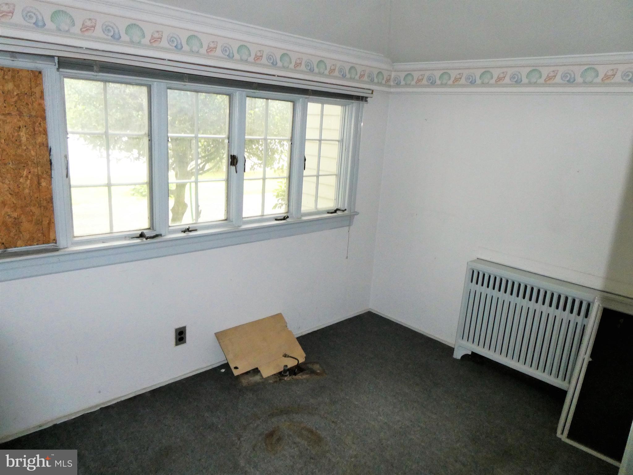 915 Stone Road Laurel Springs, NJ 08021 - Photo 13 of 30 an empty room with a window