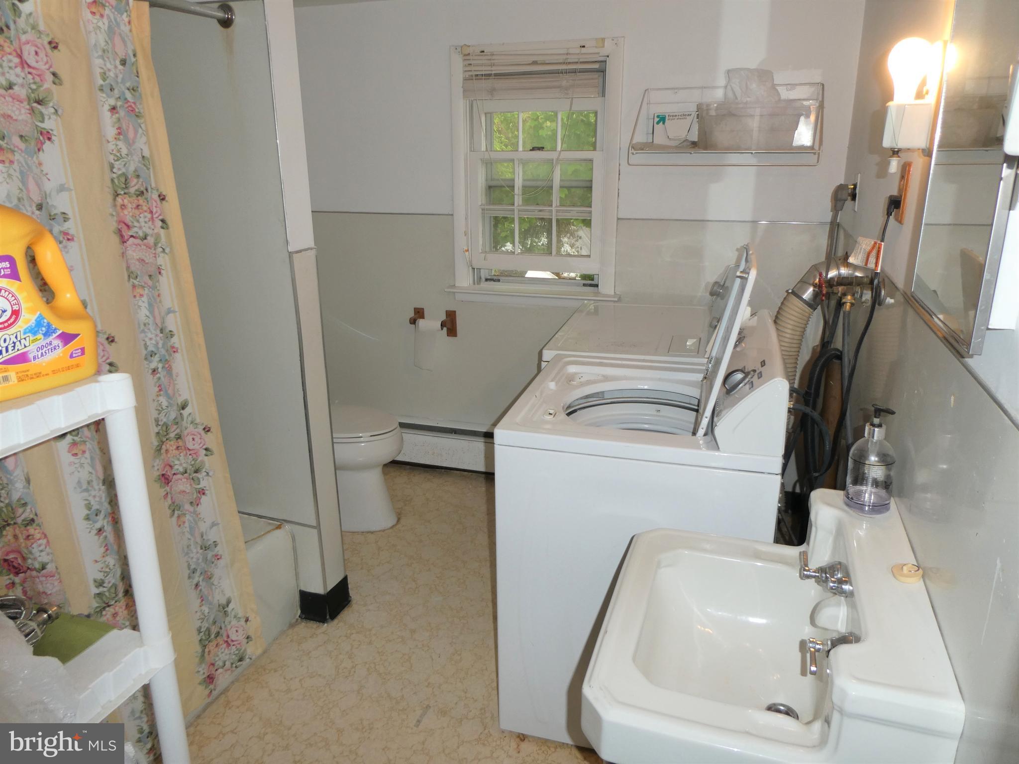 915 Stone Road Laurel Springs, NJ 08021 - Photo 17 of 30 a bathroom with a sink and a toilet