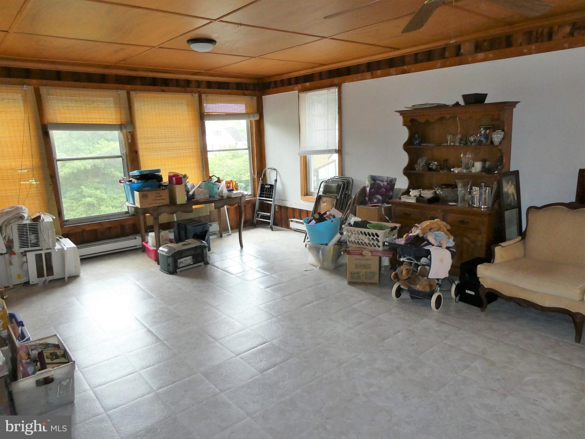 915 Stone Road Laurel Springs, NJ 08021 - Photo 18 of 30 a living room with furniture and a large window