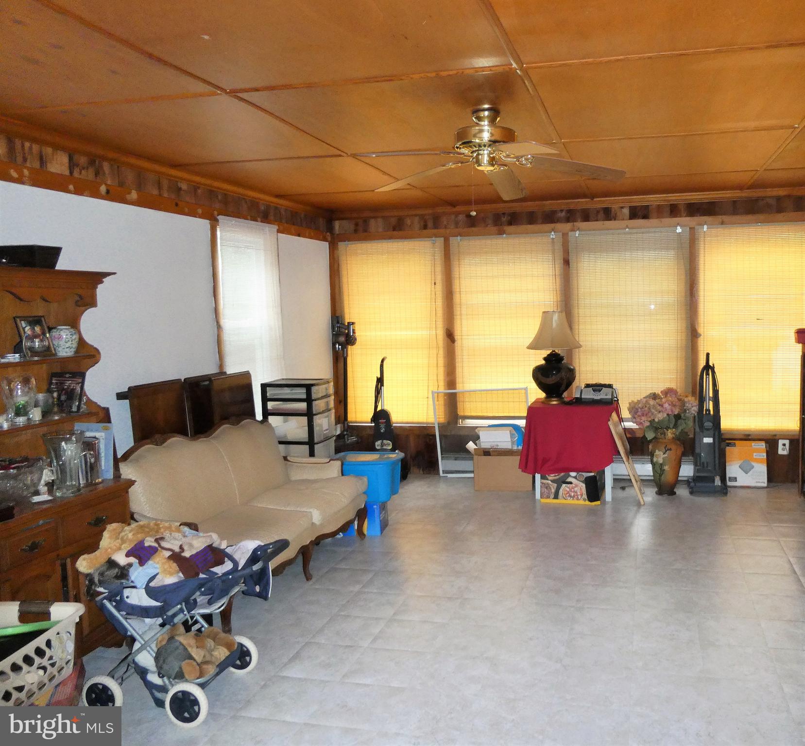 915 Stone Road Laurel Springs, NJ 08021 - Photo 19 of 30 a living room with furniture and floor to ceiling window