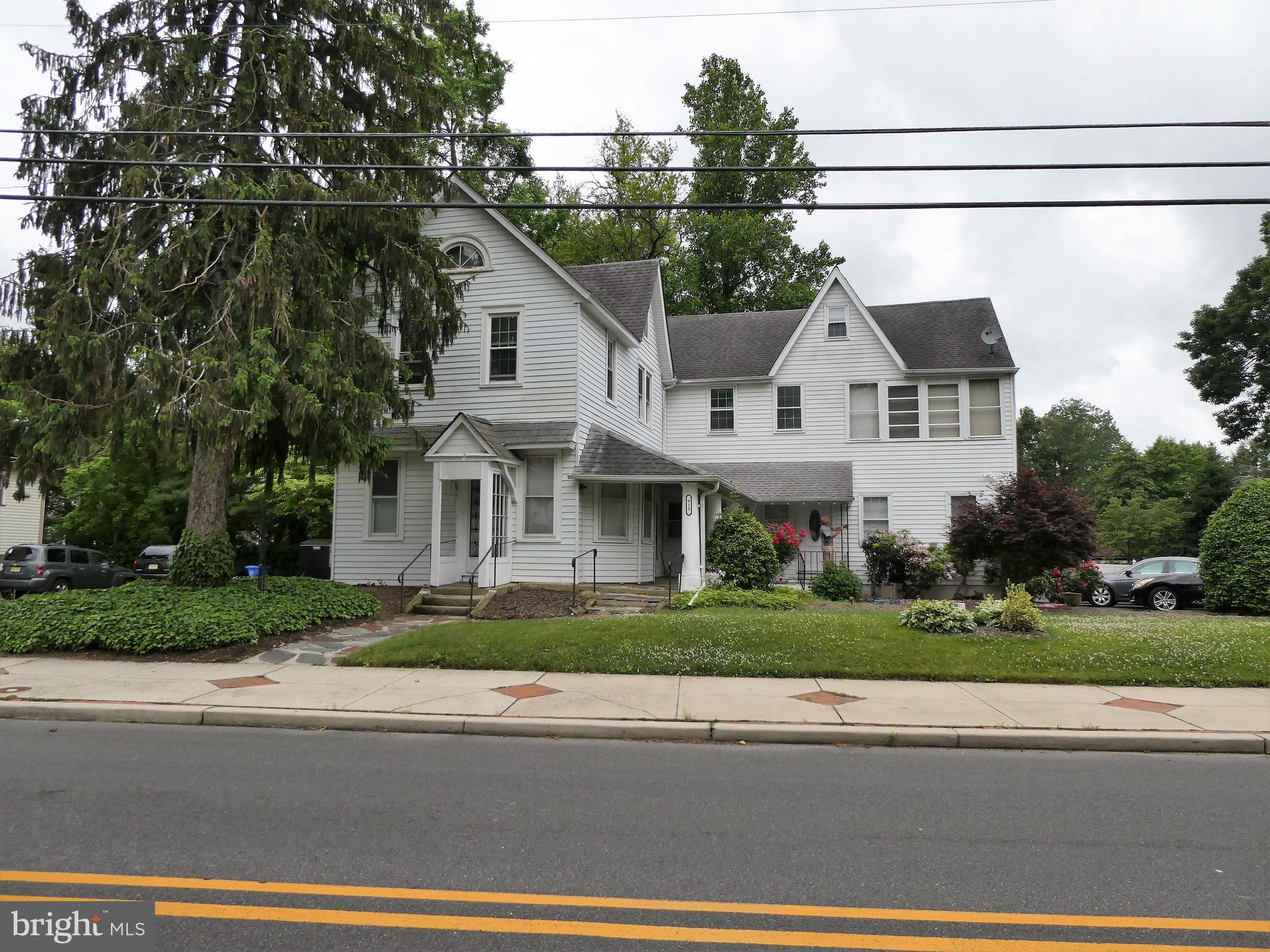 915 Stone Road Laurel Springs, NJ 08021 - Photo 25 of 30 a front view of a house with a garden and plants