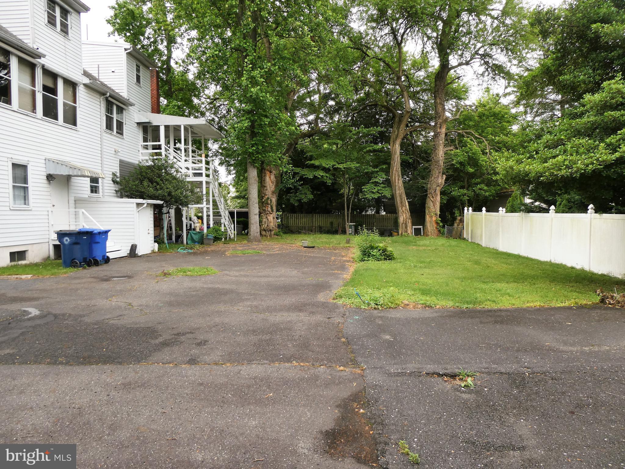 915 Stone Road Laurel Springs, NJ 08021 - Photo 29 of 30 a front view of a house with a yard and trees
