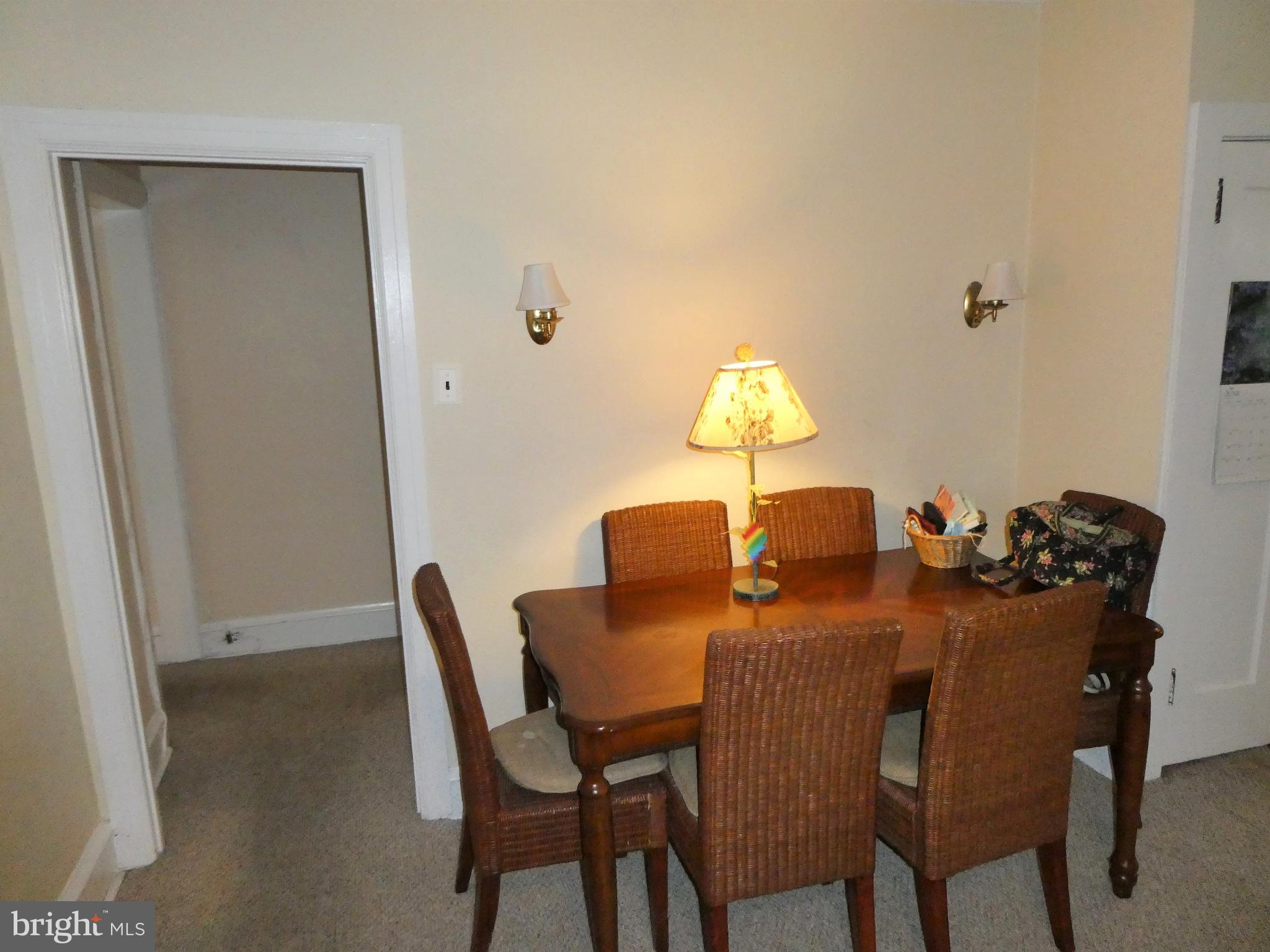 915 Stone Road Laurel Springs, NJ 08021 - Photo 4 of 30 a dining room with furniture and chandelier