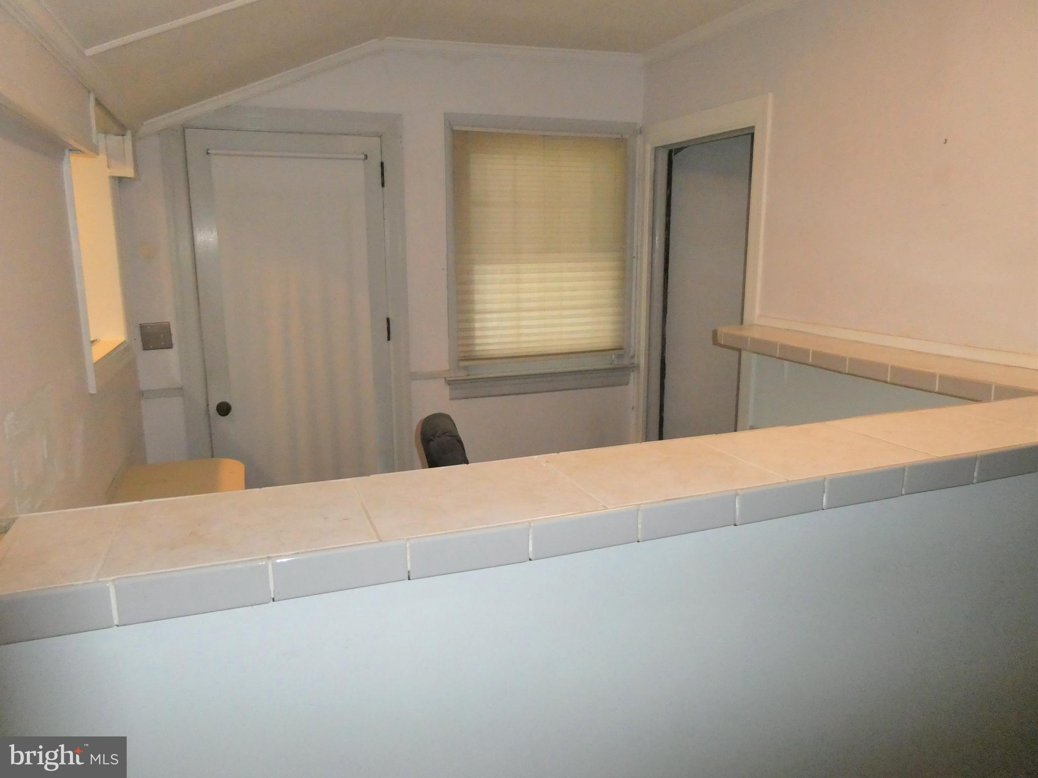 915 Stone Road Laurel Springs, NJ 08021 - Photo 7 of 30 a view of an empty room and window