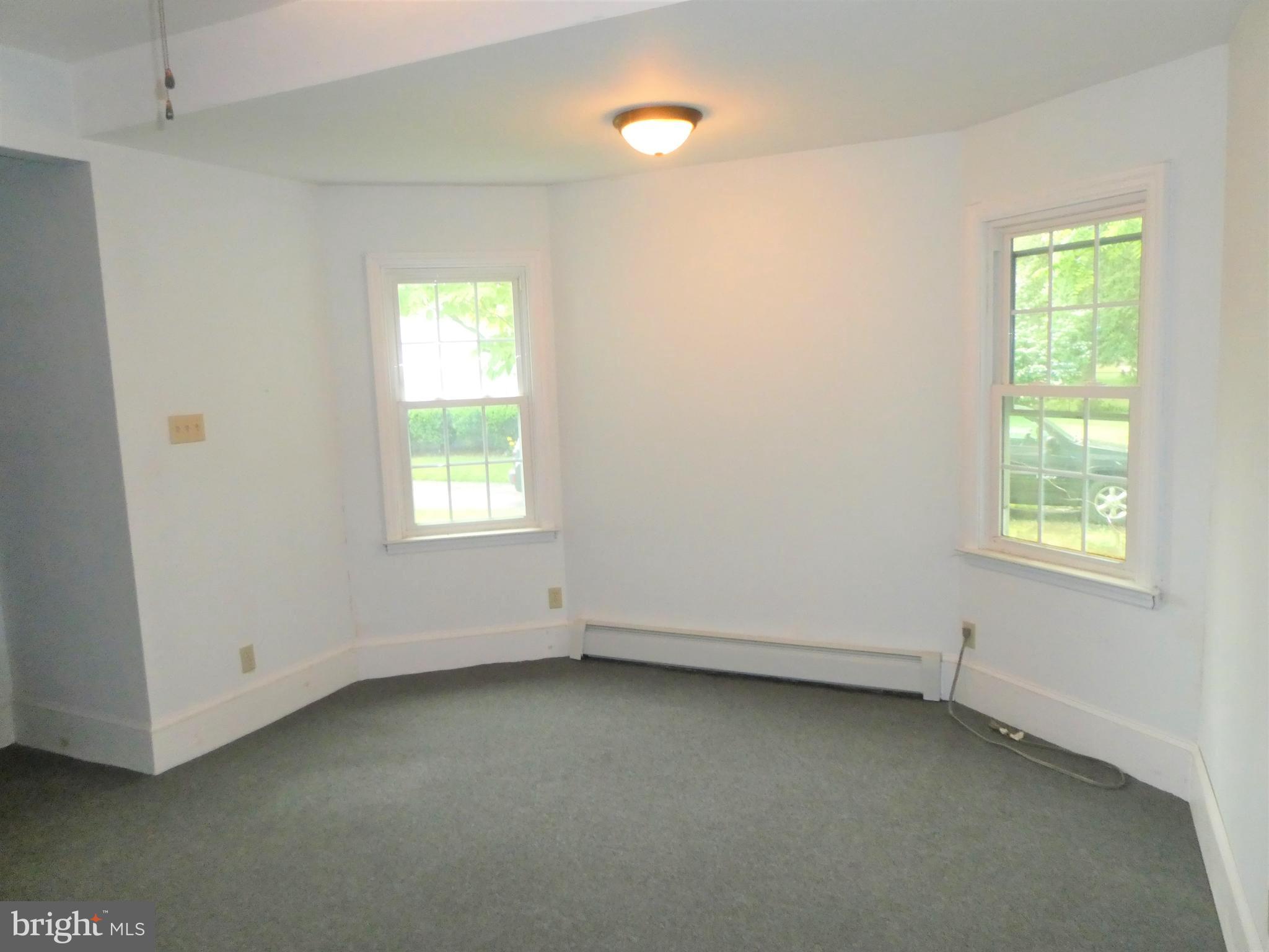 915 Stone Road Laurel Springs, NJ 08021 - Photo 9 of 30 an empty room with a window