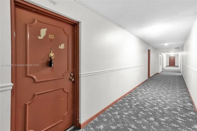 a room with furniture and a chandelier