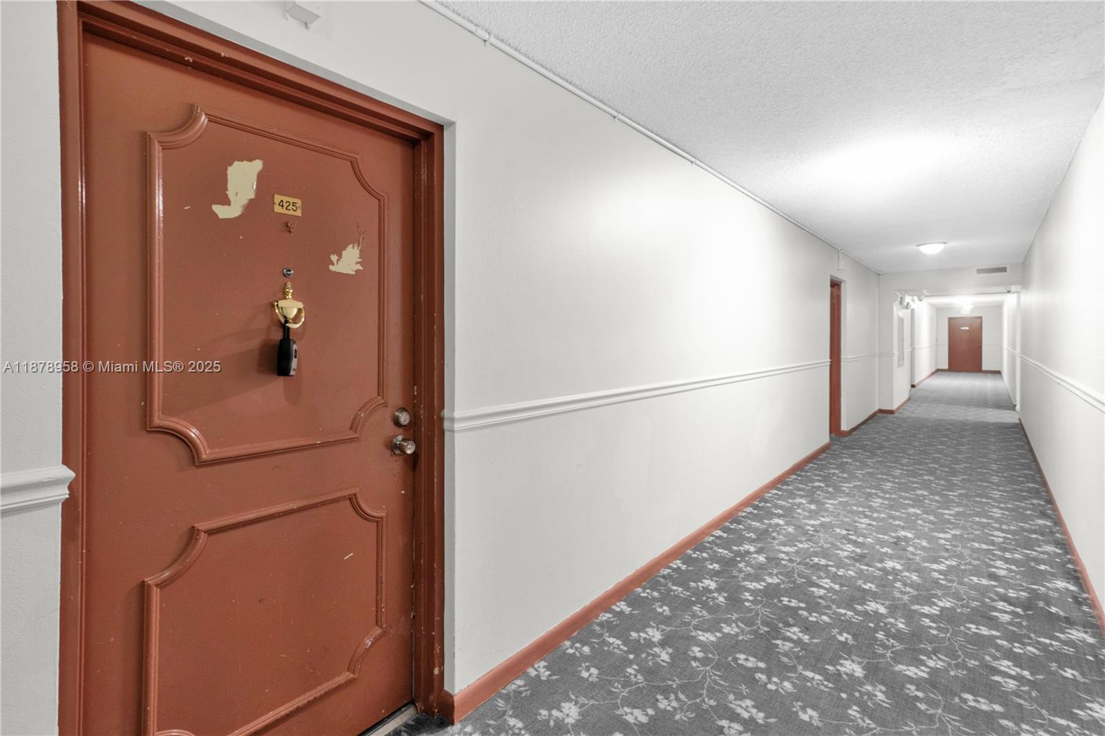9355 Southwest 8th Street, Unit 425 Boca Raton, FL 33428 - Photo 25 of 42 a view of a hallway