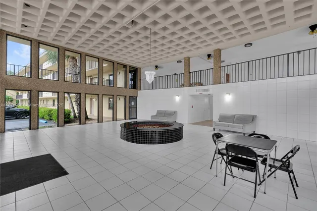 a room with furniture and a book shelf