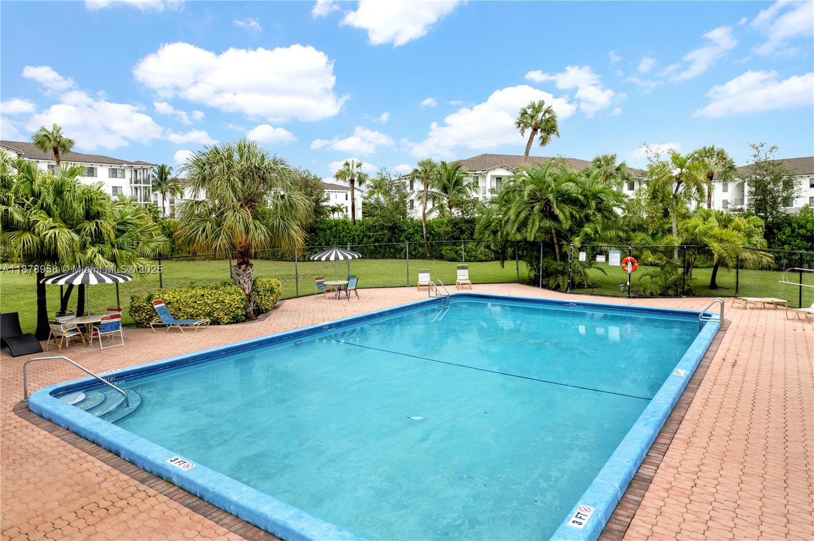 9355 Southwest 8th Street, Unit 425 Boca Raton, FL 33428 - Photo 33 of 42 a view of a tennis court