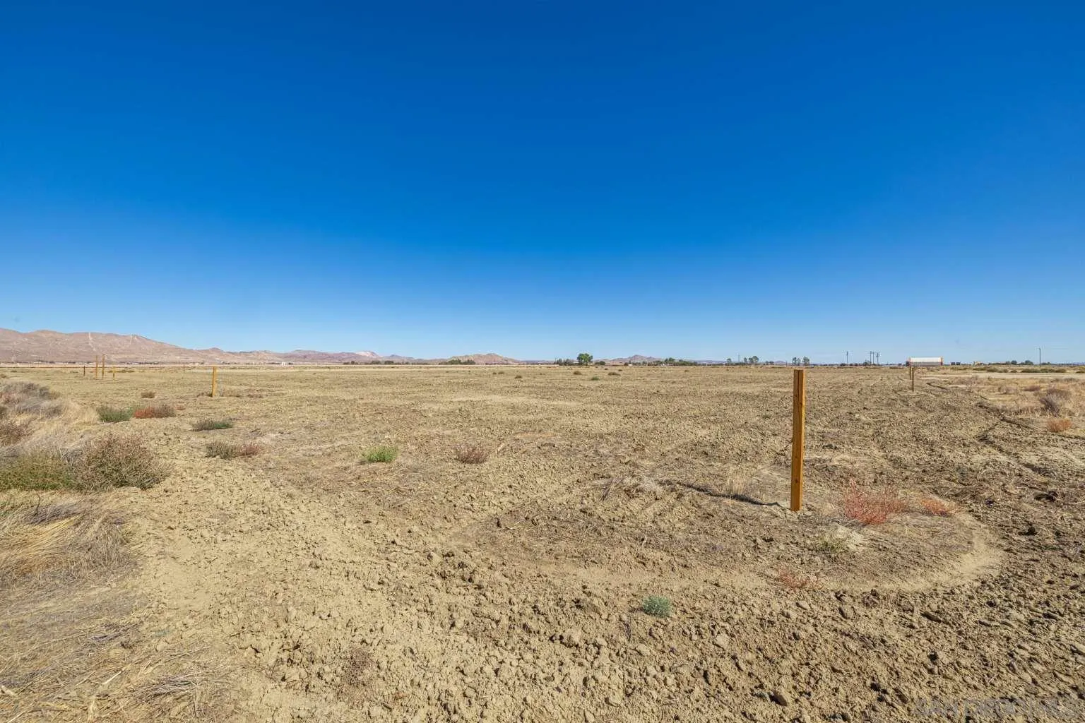 0 Tbd, Unit 1 Rosamond, CA 93560 - Photo 21 of 43 a view of a dry yard and mountain view