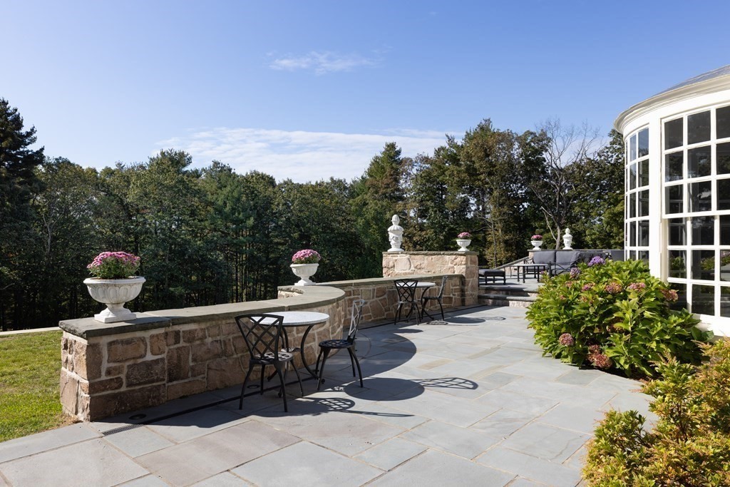 32 Parkman Way Needham, MA 02492 - Photo 15 of 35 a view of a terrace with sitting area